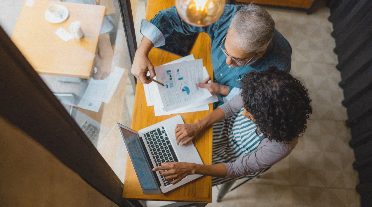 Man and woman looking at data