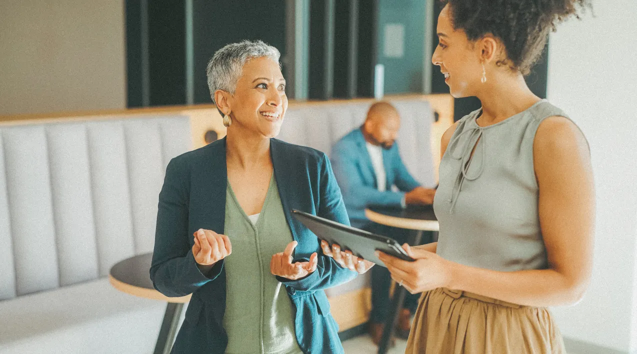 Two diverse women talking